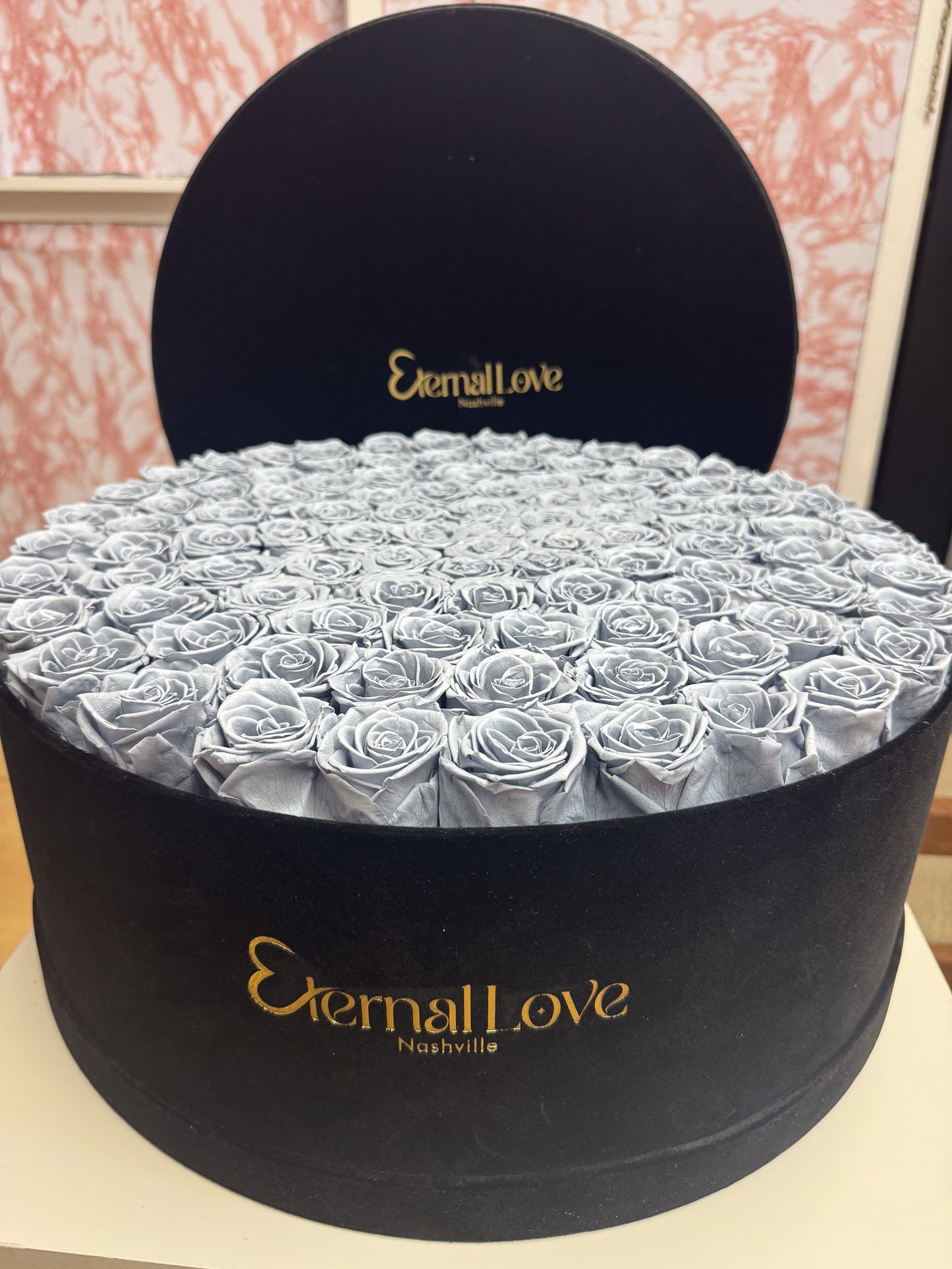 Roses In A Round Box
