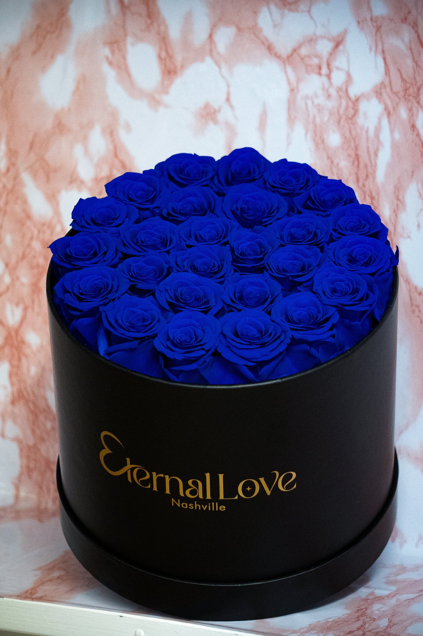 Roses In A Round Box